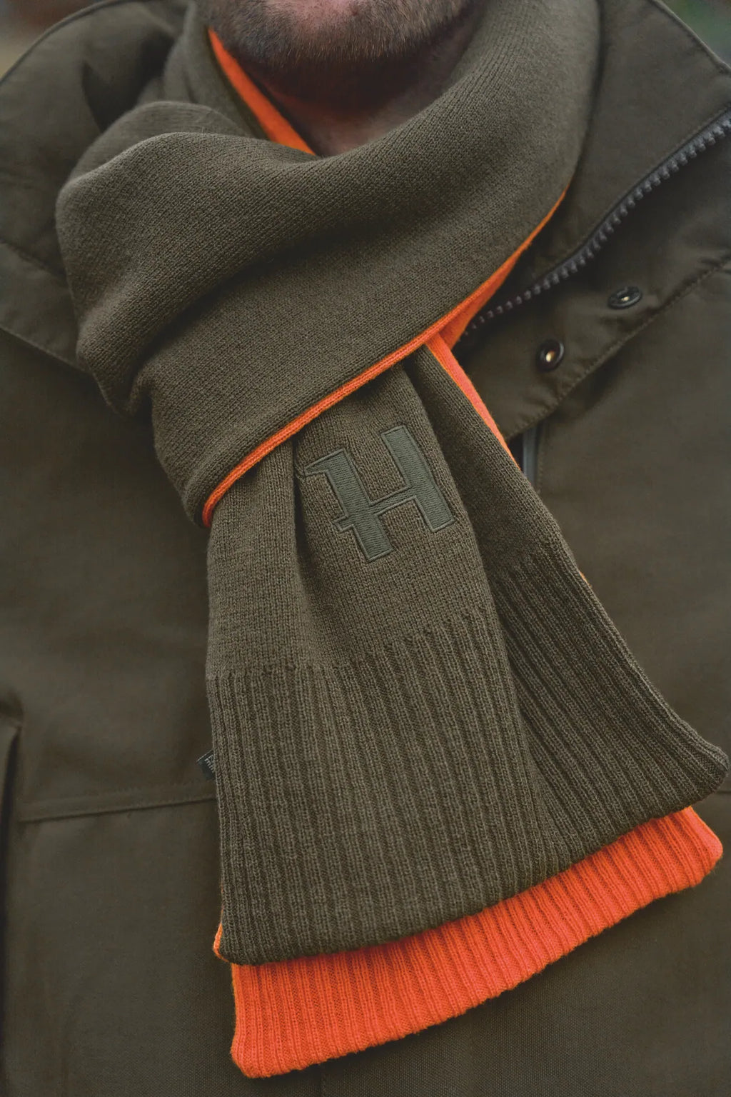 Härkila reversible Scarf - Willow green/Orange